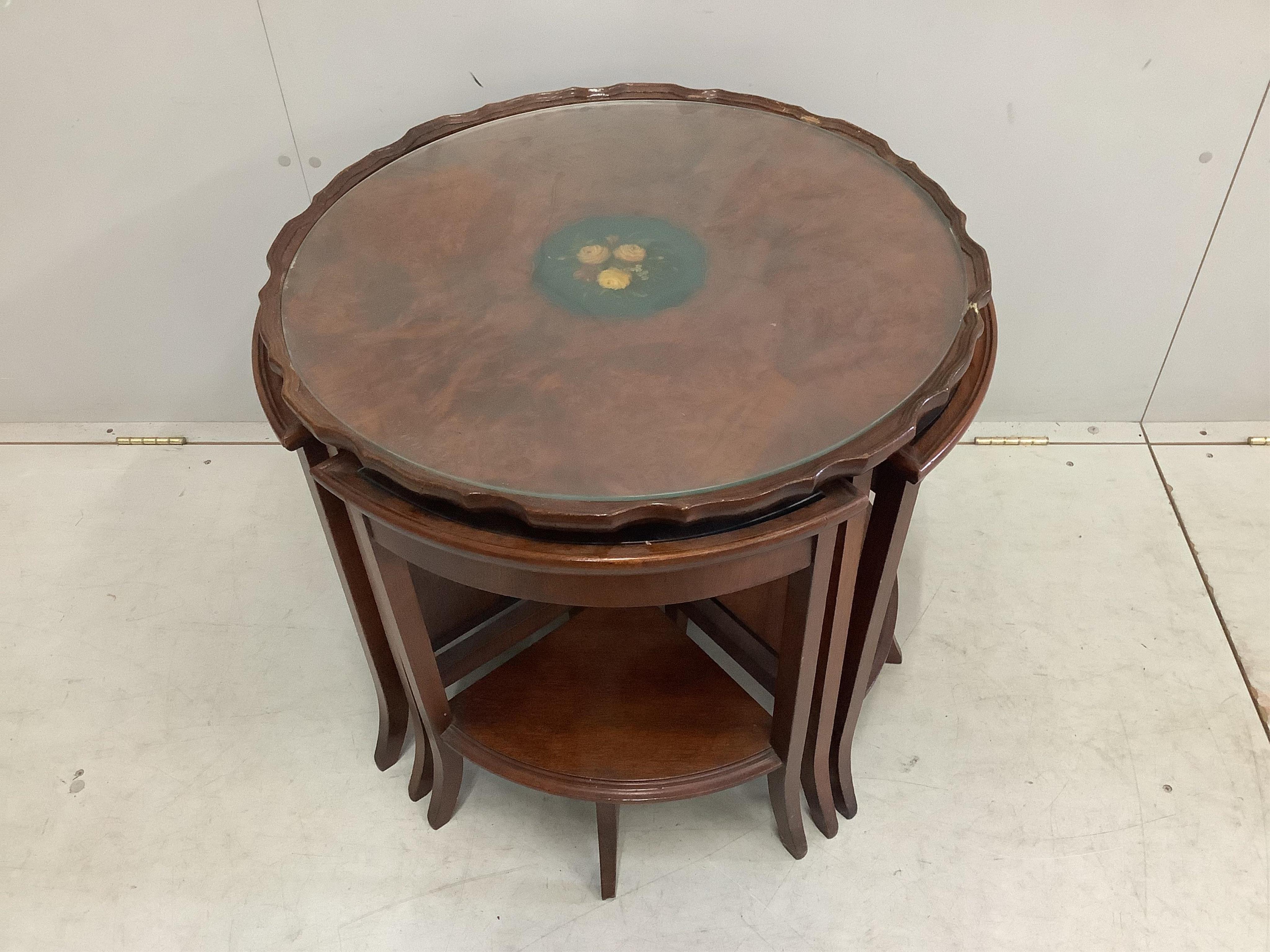 Four (two pairs) George I style painted walnut caned chairs and a similar circular nest of tables